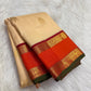Sandalwood ivory handwoven pure silk Kanchipuram Kai Korvai saree with gold zari twin parrot buttas and raspberry-red border