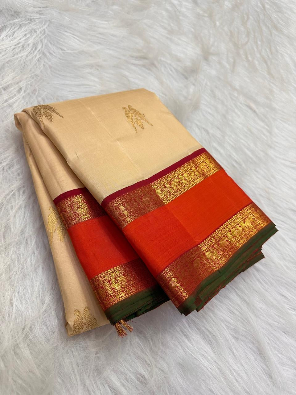 Sandalwood ivory handwoven pure silk Kanchipuram Kai Korvai saree with gold zari twin parrot buttas and raspberry-red border