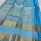 Sky blue and aqua vintage Kanchipuram Rettapet saree, gold zari Rettapet paired border close-up, handwoven gold zari and traditional detailing