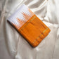 White and orange handwoven pure silk Kanchipuram Korvai saree — overview of the full saree drape