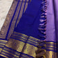 Lavender Oodha Kanchipuram Zari Kattam silk saree with grand blue zari pallu at a Meenakshi Thirukalyanam