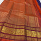 Deep Oodha blue Kanchipuram Zari Kattam silk saree with copper-gold pallu at a Sri Chakra puja gathering