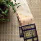 Ornate pallu and border of Pale Peach Pink & Deep Navy Blue Korvai Kanchipuram silk saree with traditional zari and silk-thread work.