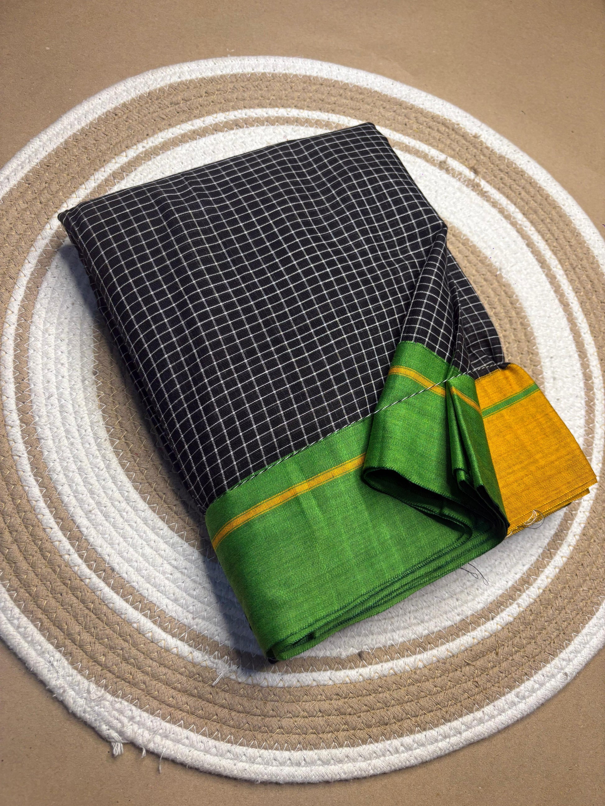 Pure cotton Patteda Anchu saree from Karnataka folded flat lay — Idam Living