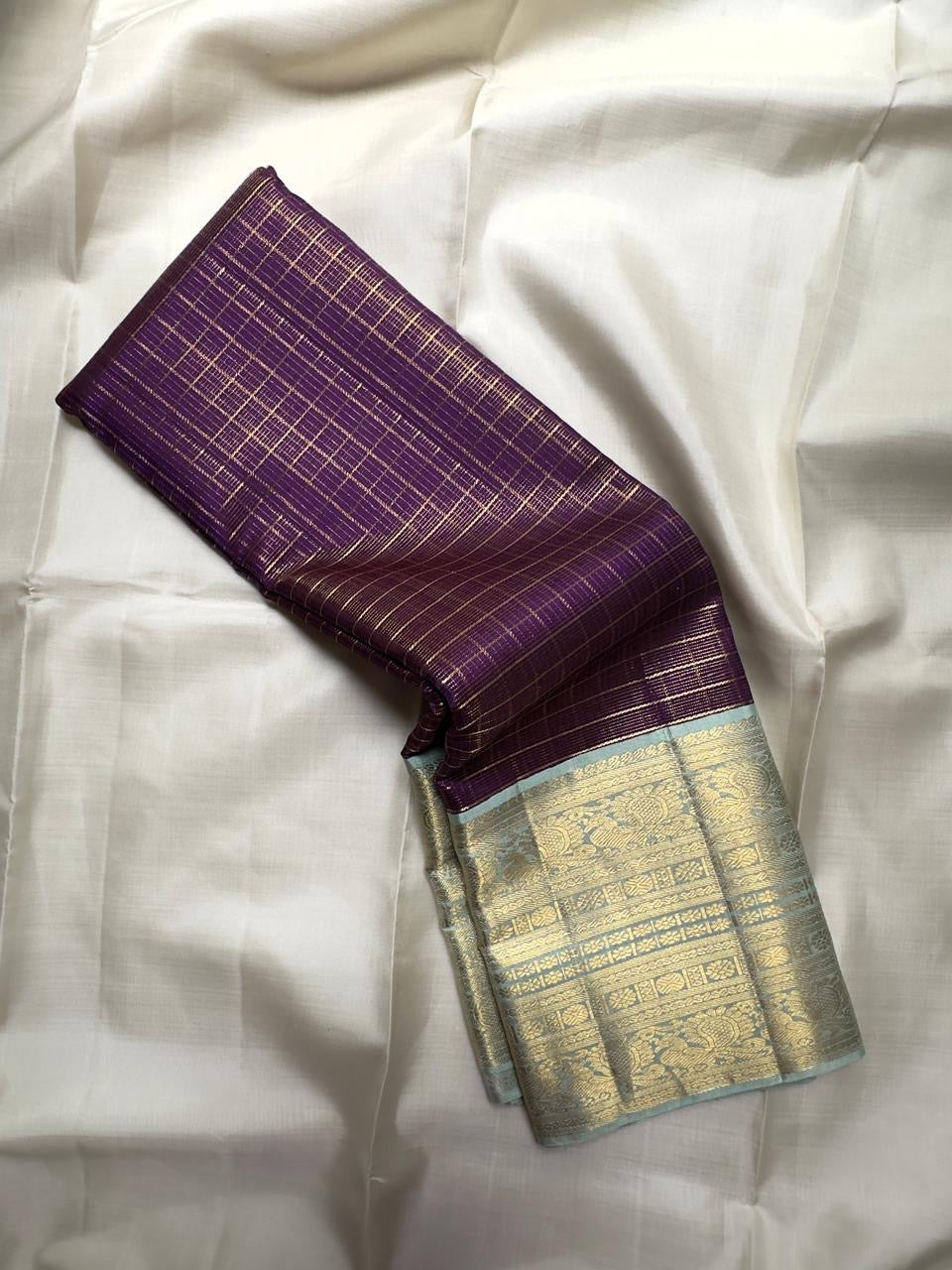 Kathiri Plum pure silk Kanchipuram Zari Kattam saree with pale Alli Pachai mint-sage gold zari border.
