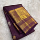Kathiri Purple Kanchipuram Butta saree with broad classic-gold zari border.