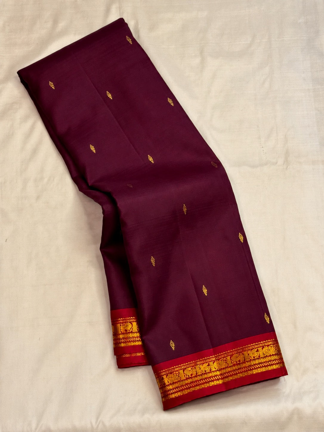 Kathiripoo Plum Kanjivaram butta saree, styled view