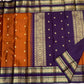Close view of the Kathiripoo purple Rettapet with Annam-style birds and curling poo-kodi floral zari work.