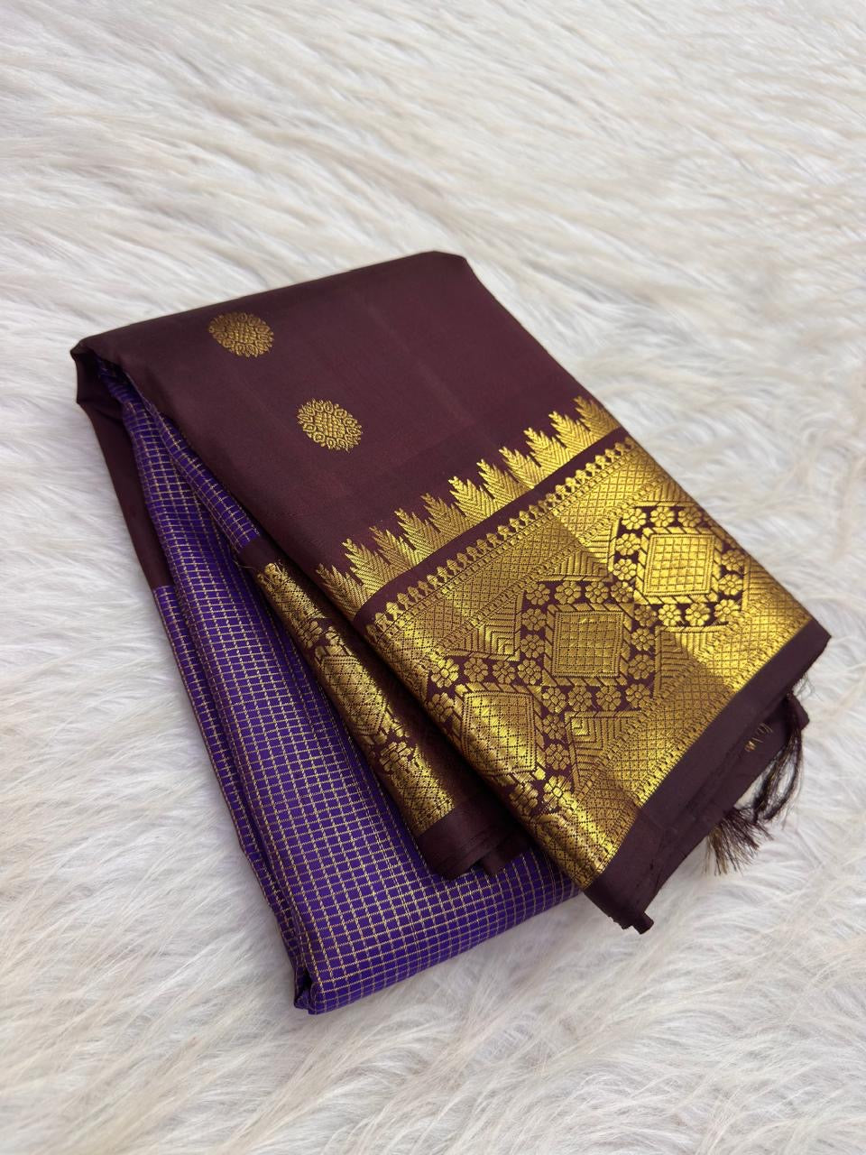 Kathiripoo Purple pure silk Kanjivaram Butta saree with antique-gold zari detailing.