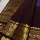 Close view of antique-gold zari butta on Kathiripoo Purple Kanjivaram silk.