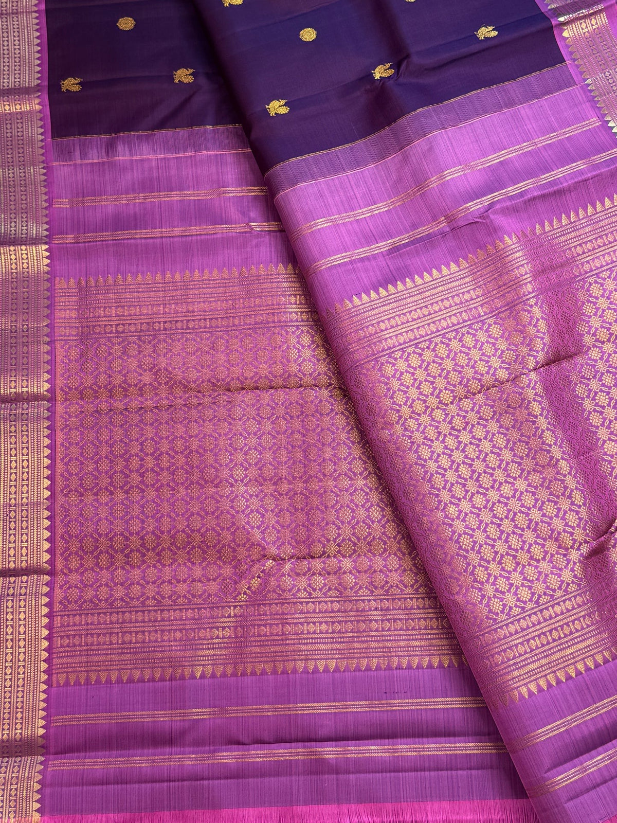 Handwoven Kanchipuram Butta saree in Kathiripoo Purple with Oodha Pink with distinctive traditional silk colouring