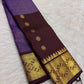Kathiripoo Purple handwoven pure silk Kanjivaram Butta saree with Deep Kanchana Brown contrast.