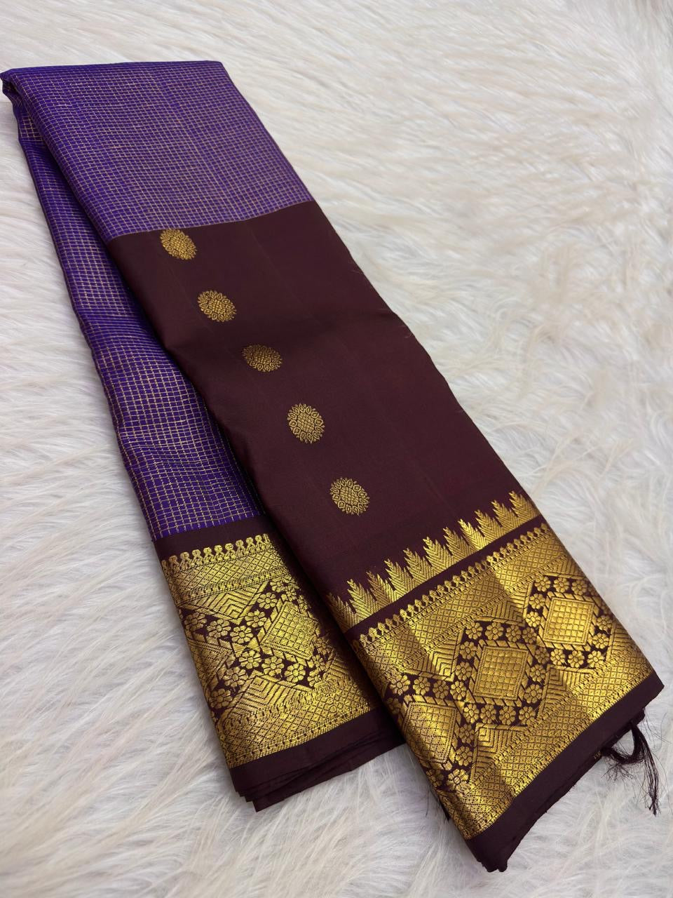 Kathiripoo Purple handwoven pure silk Kanjivaram Butta saree with Deep Kanchana Brown contrast.
