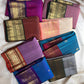 Lavender Kathiripoo Kanchipuram body framed by a warm ceremonial rust-red to Arakku-toned border.