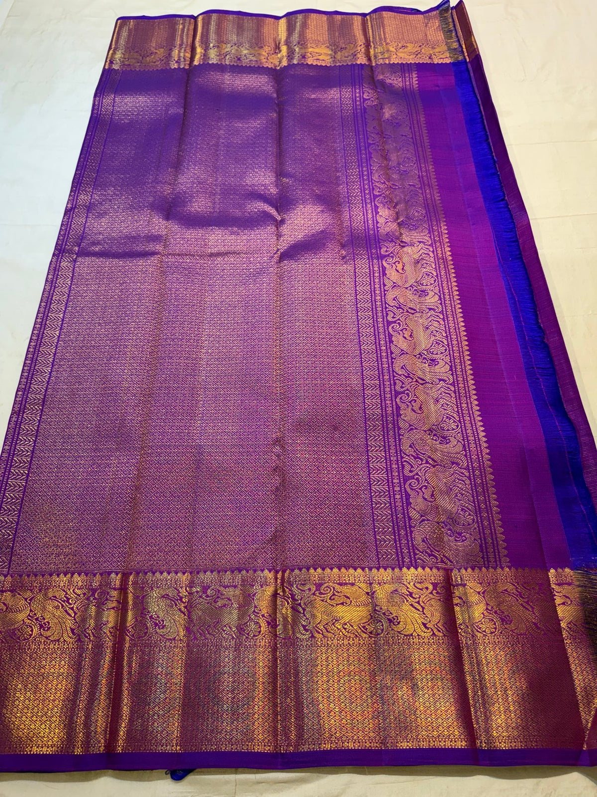 Kathiripoo Purple pure silk Kanchipuram Vairaoosi saree with Twin Bird gold zari buttas.