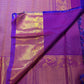 Kathiripoo Purple pure silk saree with directional Vairaoosi zari shimmer and gold bird motifs.