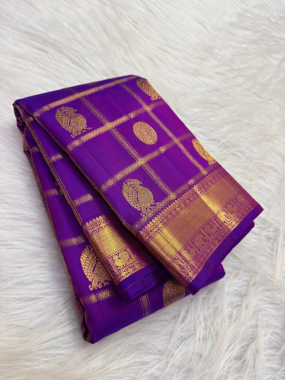 Kathiripoo Violet Pure Silk Kanjivaram saree with classic-gold zari ornament.