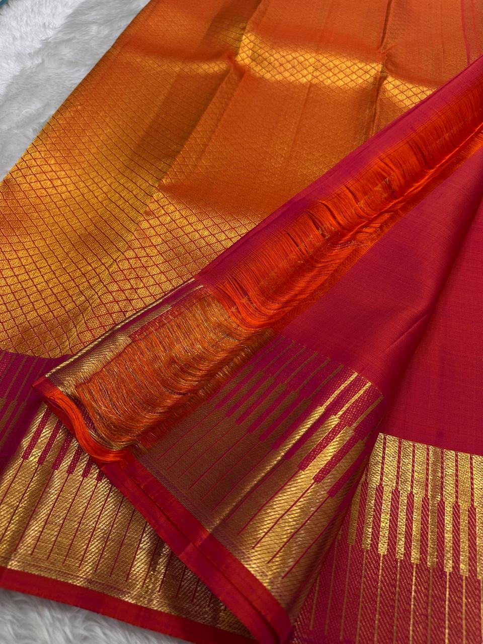 Dense Kanchipuram silk body woven with a fine all-over gold diamond grid