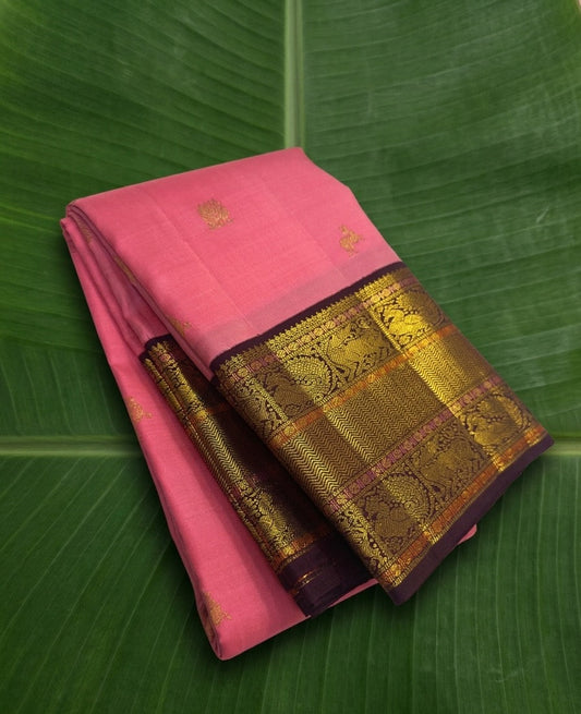 deep dark pink Kanchipuram silk saree with kv weave folded view