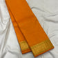 Kesari Orange Handwoven Pure Silk Kanjipuram Butta Saree with Green-Edged Gold Zari Border