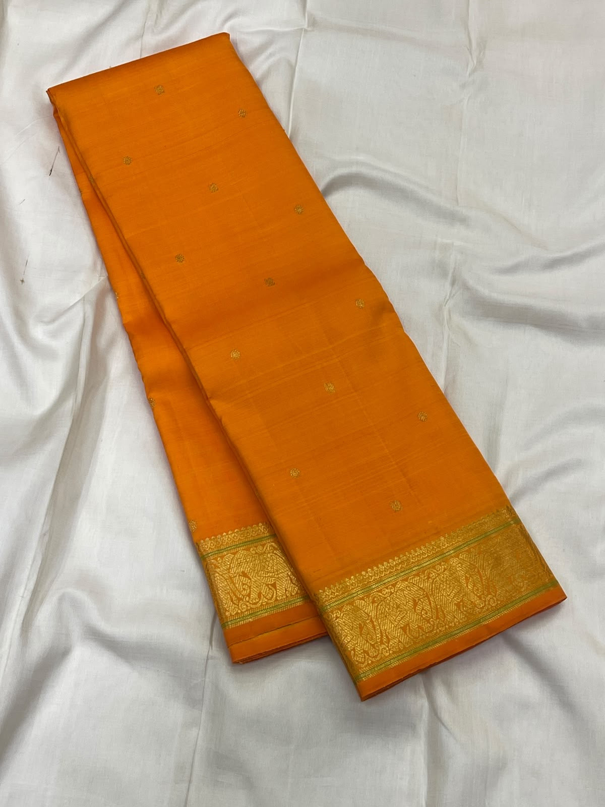 Kesari Orange Handwoven Pure Silk Kanjipuram Butta Saree with Green-Edged Gold Zari Border