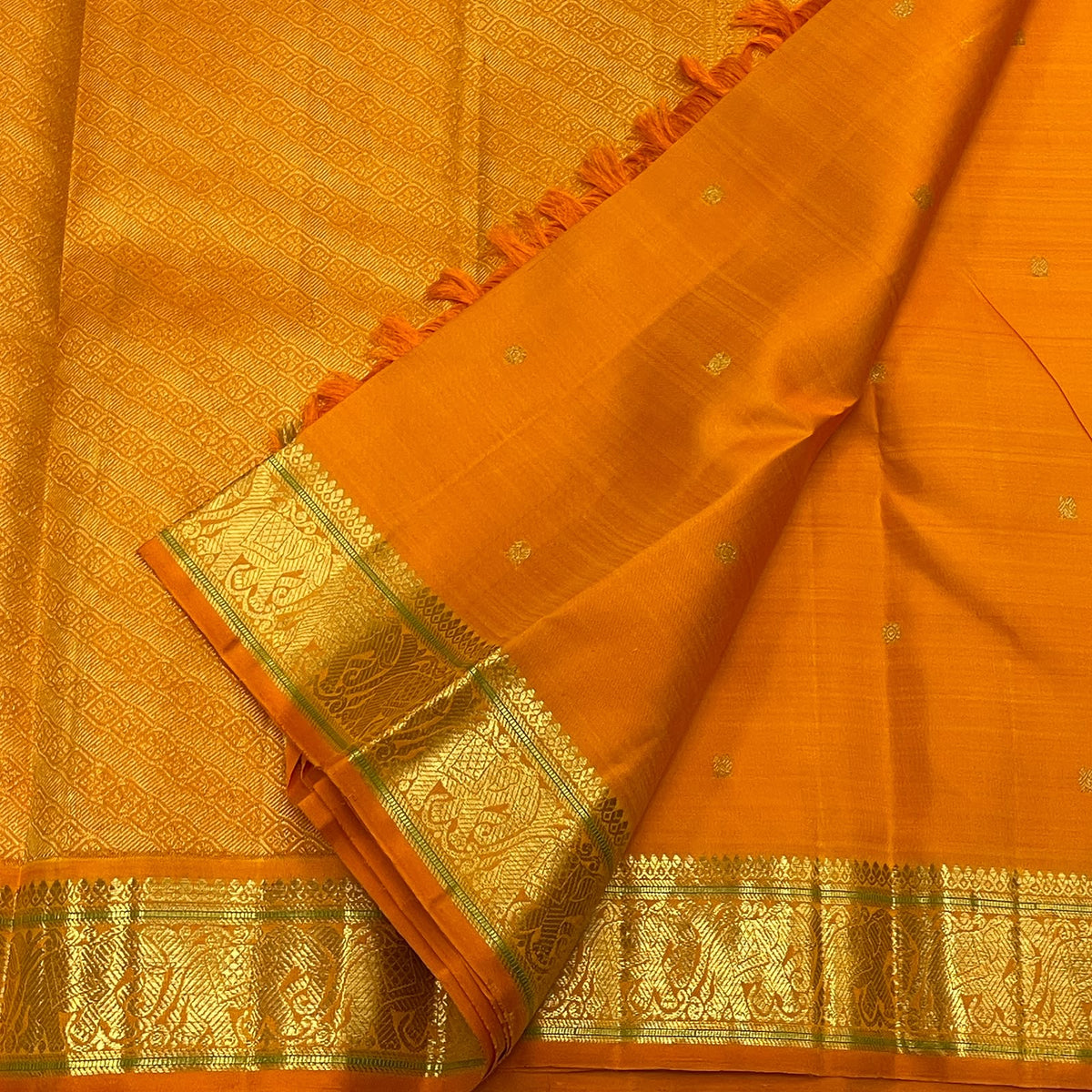 Kesari Orange Handwoven Pure Silk Kanjipuram Butta Saree with Green-Edged Gold Zari Border