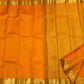Kesari Orange Handwoven Pure Silk Kanjipuram Butta Saree with Green-Edged Gold Zari Border