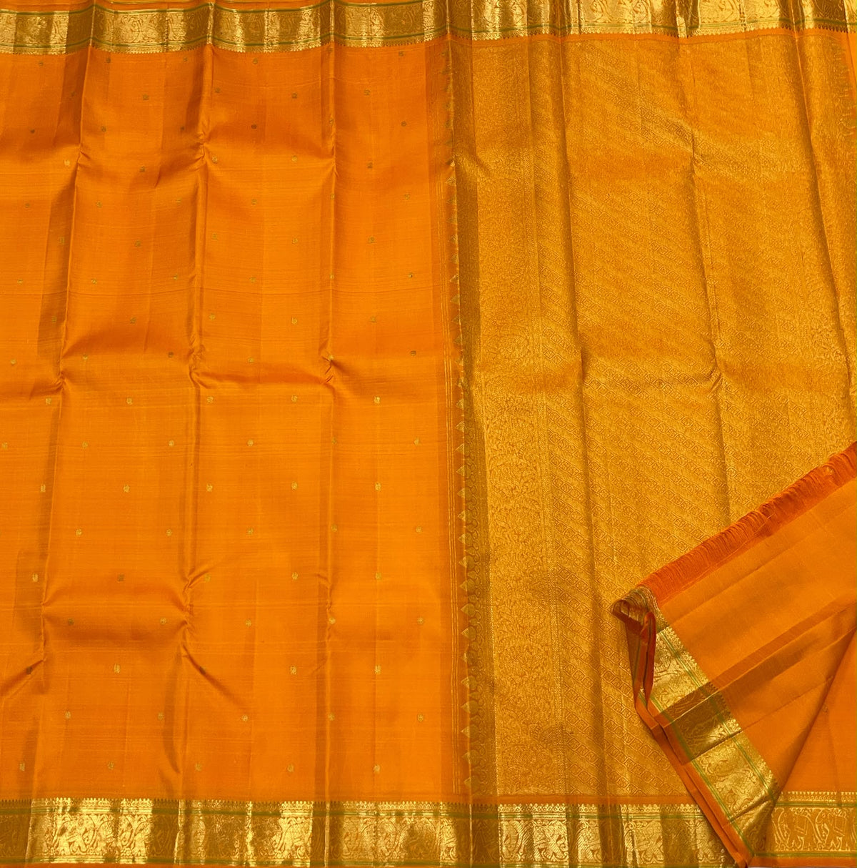 Kesari Orange Handwoven Pure Silk Kanjipuram Butta Saree with Green-Edged Gold Zari Border