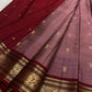 Close-up of Kili Butta antique gold zari motifs on Kanjipuram silk saree