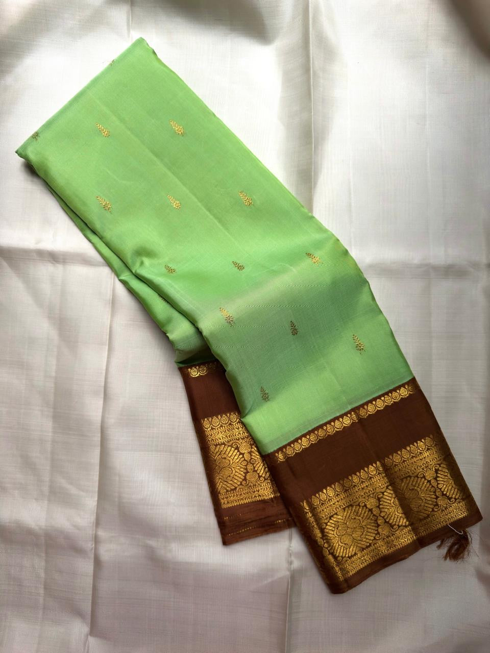Kili Pachai Pure Silk Kanchipuram Korvai saree with Kaapi Brown Kamalam zari border