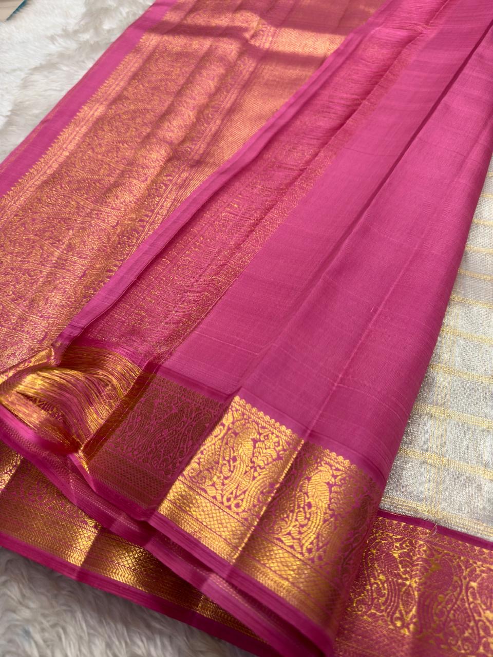 Ivory Kora Organza silk with fine gold-zari Kattam body.