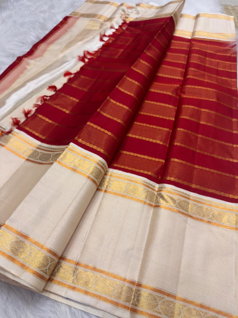 Arakku red handwoven pure silk Kanjeevaram Rettapet saree with Veldhari zari bands, full view