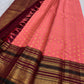 Korvai elephant zari border close-up on Coral Peach Kanchi Pattu silk saree