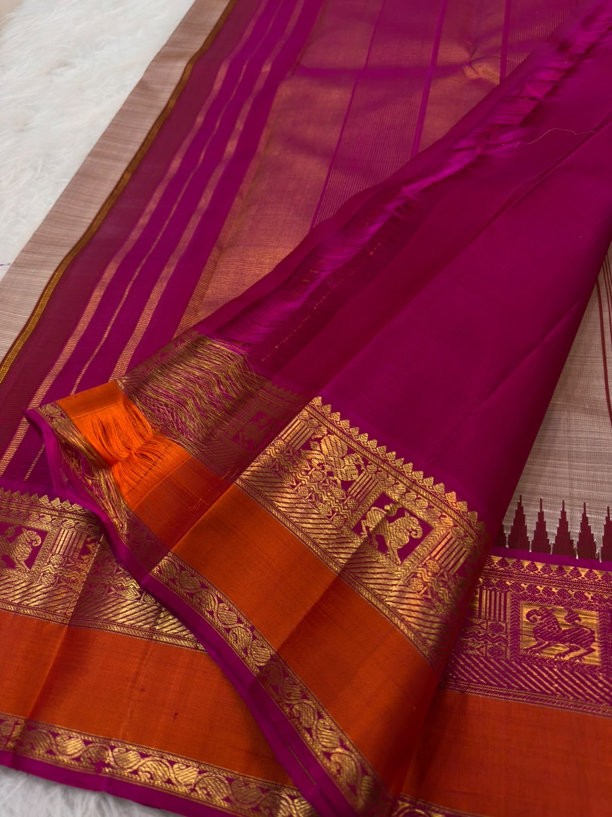 Pallu zari detail on Warm Beige and Magenta Kanchipuram Korvai silk saree