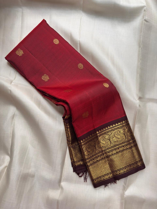 Ruby red Kanjipuram saree with gold zari floral buttas — Idam Living.