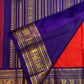 Royal blue border with gold zari motifs on kungumapoo orange Kanchipuram silk saree