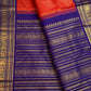 Close-up of Vairaoosi zari detail on kungumapoo orange Kanchipuram pure silk saree