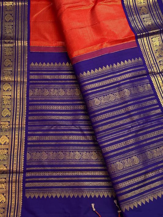 Close-up of Vairaoosi zari detail on kungumapoo orange Kanchipuram pure silk saree