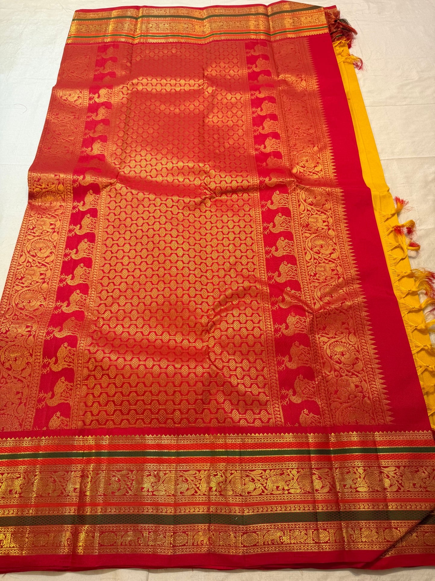 Turmeric Yellow Handwoven Pure Silk Kanjeevaram Saree with Kumkum Red Korvai Zari Border