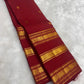 Detail of gold zari elephant (Yaanai) motifs on the Arakku Red Kanchipuram silk border