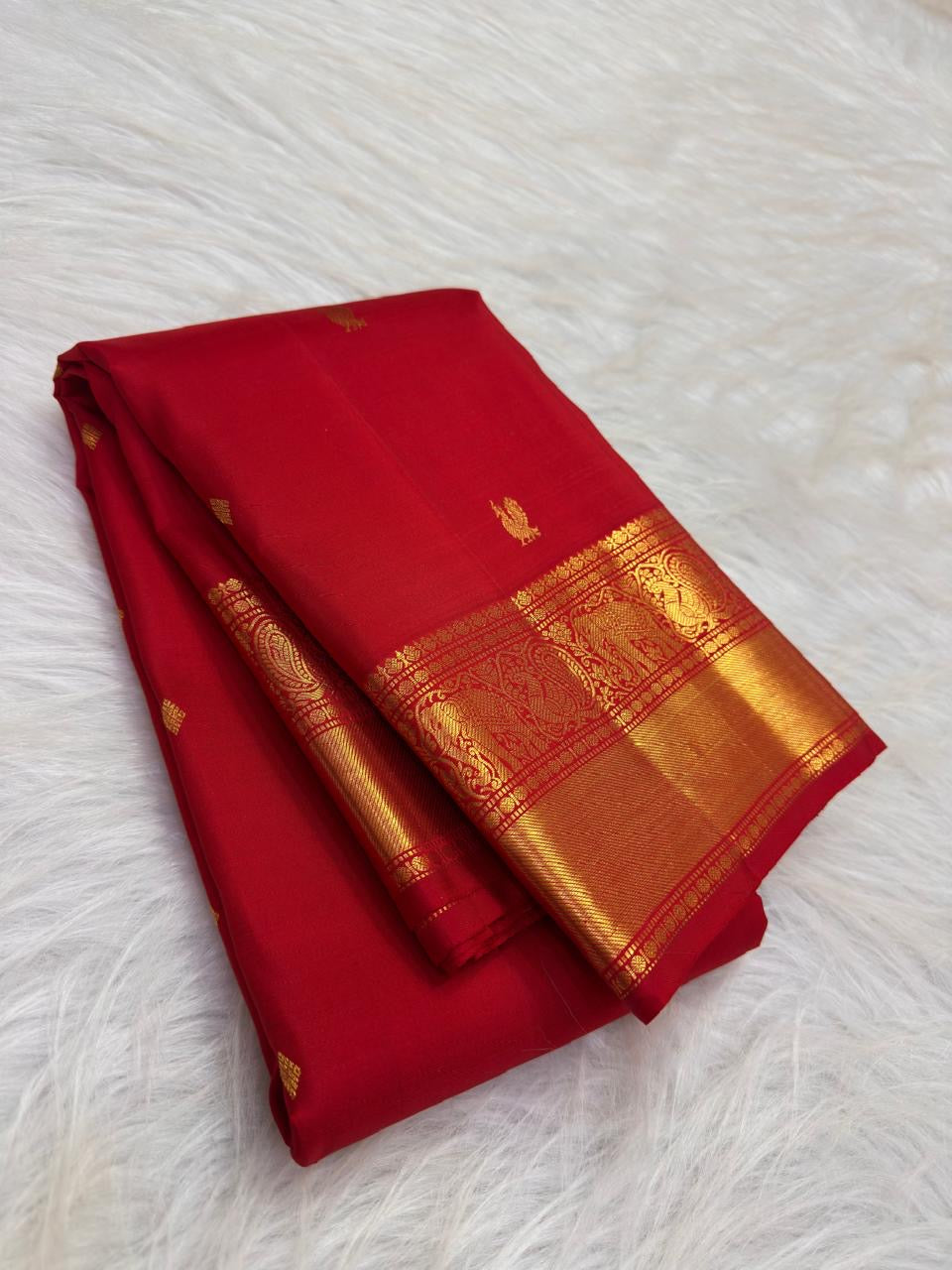 Kumkum Red Handwoven Pure Silk Kanjivaram Saree with Mayil Zari Buttas and Elephant Peacock Zari Border