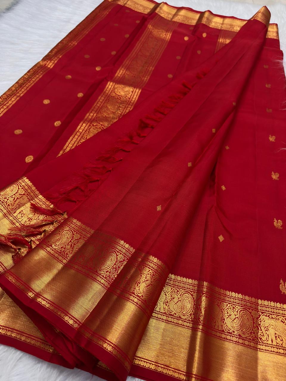 Kumkum Red Handwoven Pure Silk Kanjivaram Saree with Mayil Zari Buttas and Elephant Peacock Zari Border