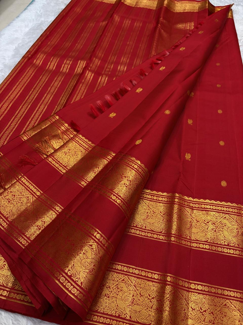 Kumkum Red and Antique Gold Handwoven Pure Silk Kanchipattu Saree with Rettapet Border and Mayil Chakram Butta