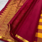 Bold red and yellow checked Kanchipuram body with spaced ornate gold zari buttas