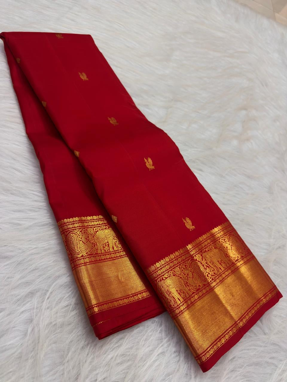 Kumkum Red Handwoven Pure Silk Kanjivaram Saree with Mayil Zari Buttas and Elephant Peacock Zari Border