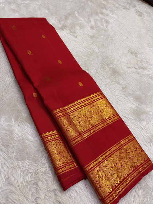 Kumkum Red and Antique Gold Handwoven Pure Silk Kanchipattu Saree with Rettapet Border and Mayil Chakram Butta
