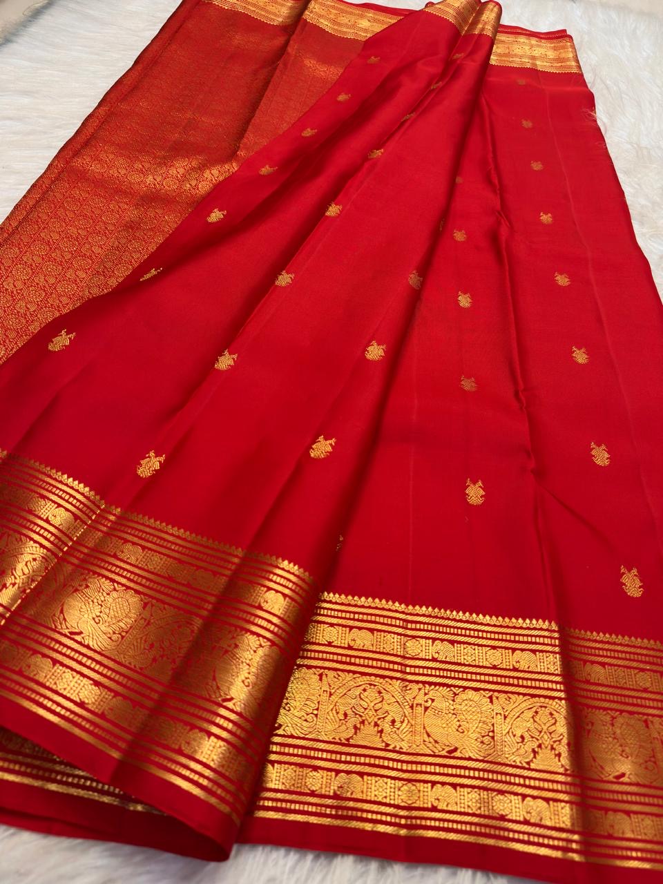 Kumkumam Red Pure Silk Kanchipuram Butta saree with traditional bird gold zari border