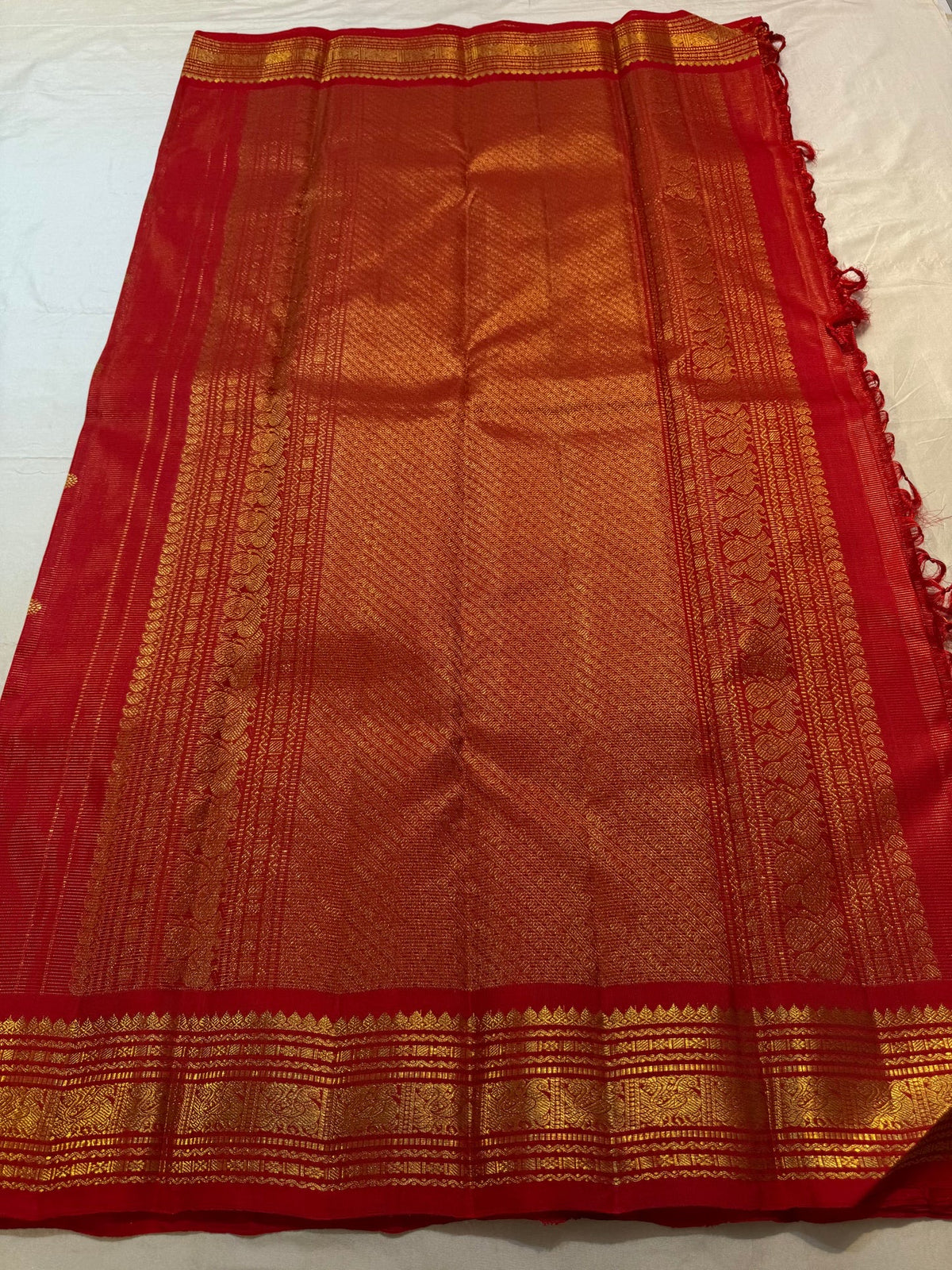 Kumkumam red Vairaoosi Kanjivaram silk saree with small gold buttas