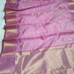 Close-up of the fine gold woven border with Raspberry Pink edging on a Lavender Pink Chanderi silk saree