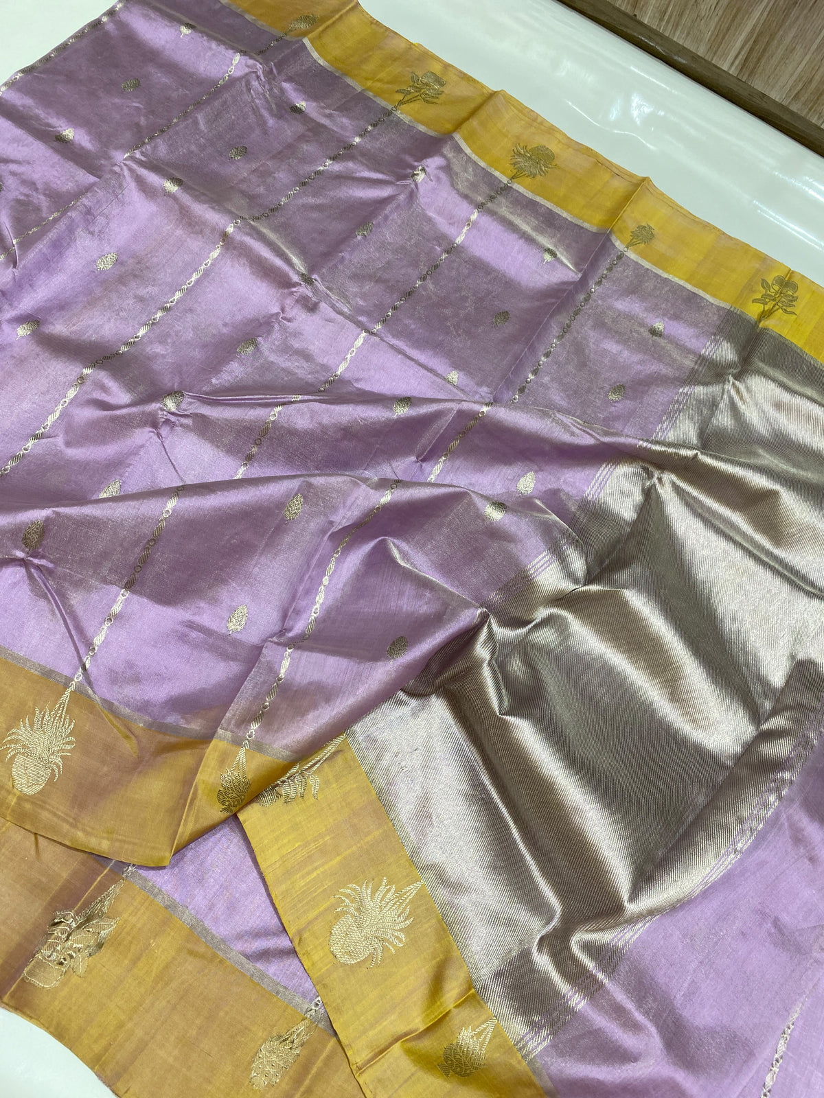 Soft lavender Tissue Pattu Silk Chanderi saree with a golden yellow border